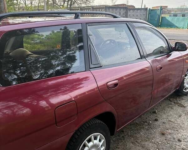 Красный Дэу Нубира, объемом двигателя 1.6 л и пробегом 190 тыс. км за 2350 $, фото 12 на Automoto.ua