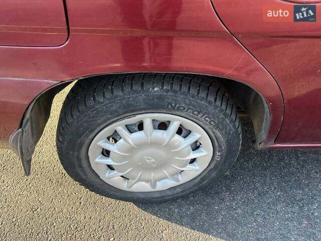 Красный Дэу Нубира, объемом двигателя 1.6 л и пробегом 190 тыс. км за 2350 $, фото 20 на Automoto.ua