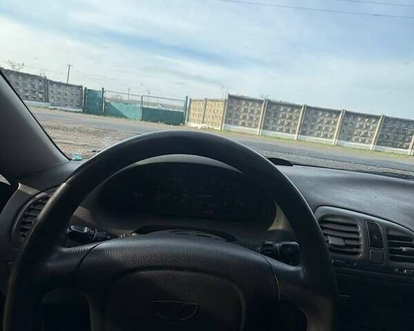 Красный Дэу Нубира, объемом двигателя 1.6 л и пробегом 190 тыс. км за 2350 $, фото 37 на Automoto.ua