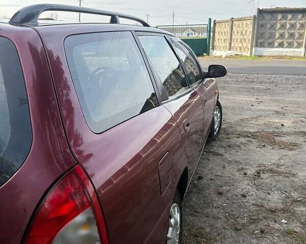 Красный Дэу Нубира, объемом двигателя 1.6 л и пробегом 190 тыс. км за 2350 $, фото 11 на Automoto.ua