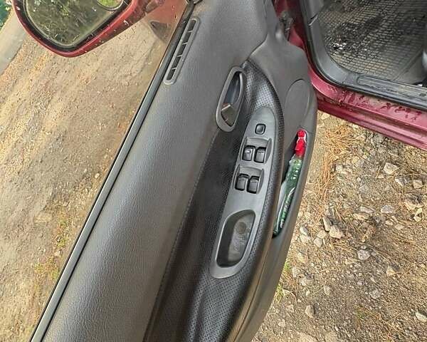 Красный Дэу Нубира, объемом двигателя 1.6 л и пробегом 190 тыс. км за 2350 $, фото 29 на Automoto.ua