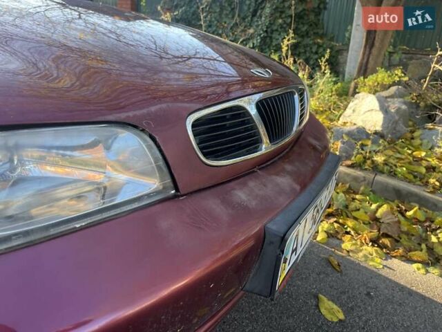 Красный Дэу Нубира, объемом двигателя 1.6 л и пробегом 190 тыс. км за 2350 $, фото 14 на Automoto.ua