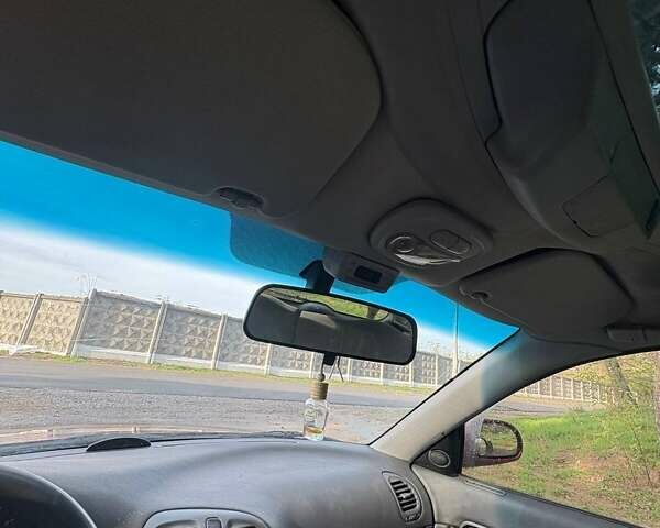 Красный Дэу Нубира, объемом двигателя 1.6 л и пробегом 190 тыс. км за 2350 $, фото 36 на Automoto.ua