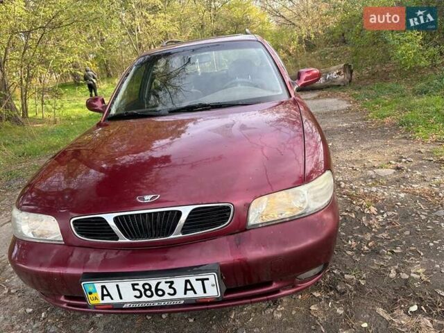 Красный Дэу Нубира, объемом двигателя 1.6 л и пробегом 190 тыс. км за 2350 $, фото 1 на Automoto.ua