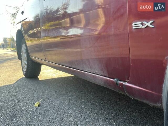 Красный Дэу Нубира, объемом двигателя 1.6 л и пробегом 190 тыс. км за 2350 $, фото 21 на Automoto.ua