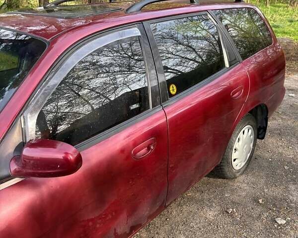 Красный Дэу Нубира, объемом двигателя 1.6 л и пробегом 190 тыс. км за 2350 $, фото 2 на Automoto.ua