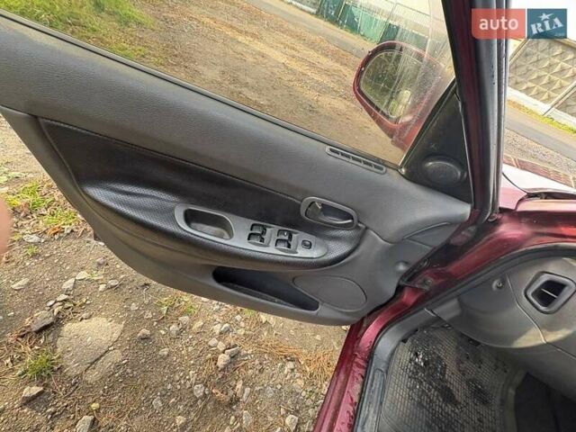 Красный Дэу Нубира, объемом двигателя 1.6 л и пробегом 190 тыс. км за 2350 $, фото 28 на Automoto.ua