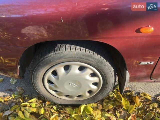 Красный Дэу Нубира, объемом двигателя 1.6 л и пробегом 190 тыс. км за 2350 $, фото 23 на Automoto.ua