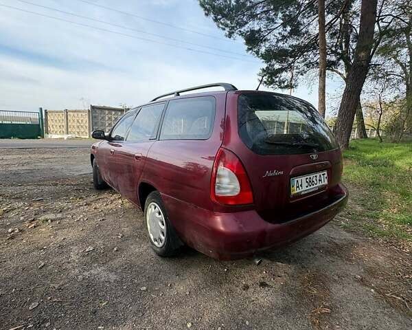 Красный Дэу Нубира, объемом двигателя 1.6 л и пробегом 190 тыс. км за 2350 $, фото 9 на Automoto.ua
