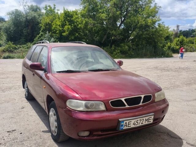Красный Дэу Нубира, объемом двигателя 1.6 л и пробегом 220 тыс. км за 1350 $, фото 1 на Automoto.ua