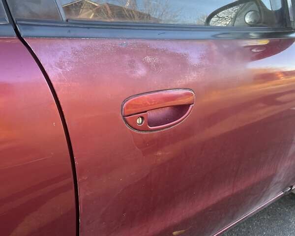 Красный Дэу Нубира, объемом двигателя 1.6 л и пробегом 190 тыс. км за 2350 $, фото 15 на Automoto.ua