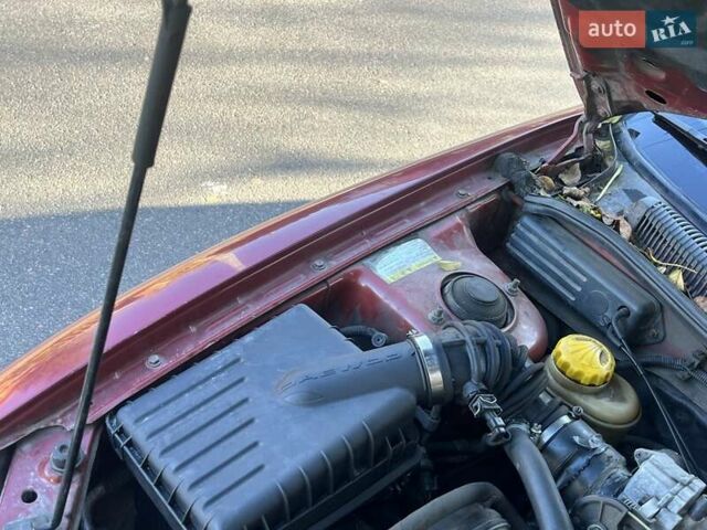 Красный Дэу Нубира, объемом двигателя 1.6 л и пробегом 190 тыс. км за 2350 $, фото 25 на Automoto.ua