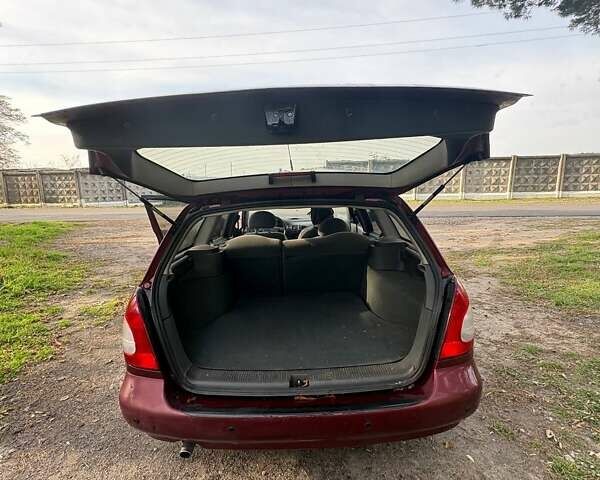 Красный Дэу Нубира, объемом двигателя 1.6 л и пробегом 190 тыс. км за 2350 $, фото 33 на Automoto.ua