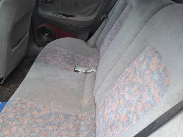 Красный Дэу Нубира, объемом двигателя 2 л и пробегом 137 тыс. км за 1537 $, фото 4 на Automoto.ua