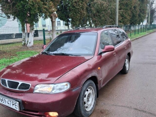 Красный Дэу Нубира, объемом двигателя 2 л и пробегом 137 тыс. км за 1537 $, фото 1 на Automoto.ua