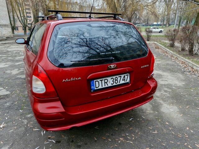 Красный Дэу Нубира, объемом двигателя 2 л и пробегом 300 тыс. км за 1200 $, фото 4 на Automoto.ua