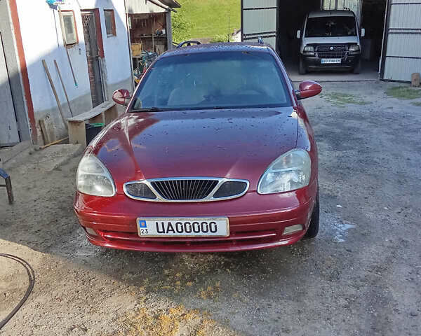 Красный Дэу Нубира, объемом двигателя 1.6 л и пробегом 340 тыс. км за 2650 $, фото 2 на Automoto.ua