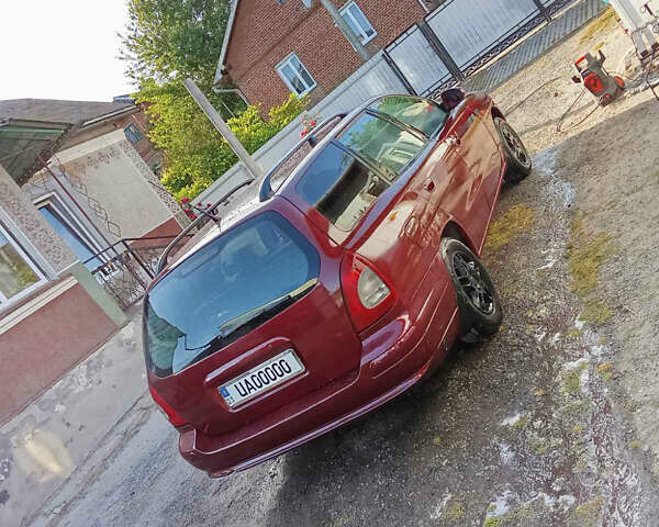 Красный Дэу Нубира, объемом двигателя 1.6 л и пробегом 340 тыс. км за 2650 $, фото 8 на Automoto.ua