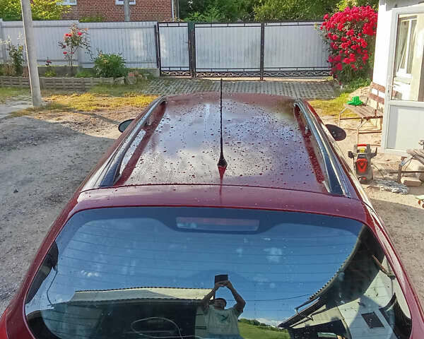 Красный Дэу Нубира, объемом двигателя 1.6 л и пробегом 340 тыс. км за 2650 $, фото 5 на Automoto.ua