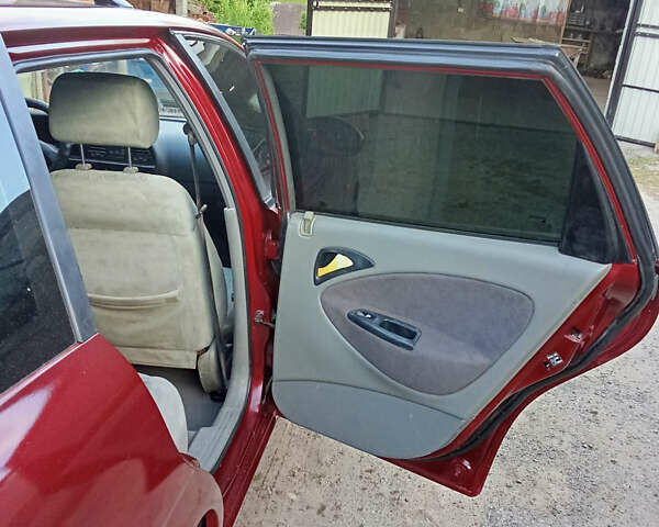 Красный Дэу Нубира, объемом двигателя 1.6 л и пробегом 340 тыс. км за 2650 $, фото 25 на Automoto.ua