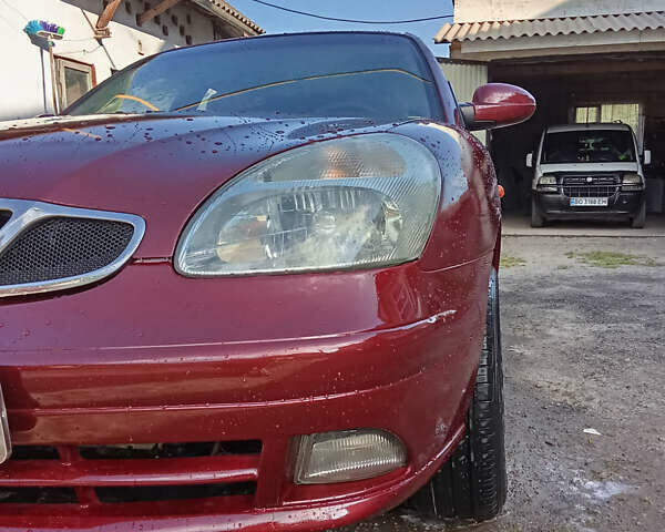 Красный Дэу Нубира, объемом двигателя 1.6 л и пробегом 340 тыс. км за 2800 $, фото 7 на Automoto.ua