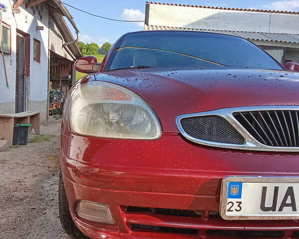 Красный Дэу Нубира, объемом двигателя 1.6 л и пробегом 340 тыс. км за 2650 $, фото 11 на Automoto.ua