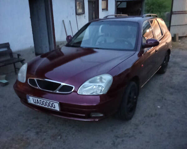 Красный Дэу Нубира, объемом двигателя 1.6 л и пробегом 340 тыс. км за 2650 $, фото 15 на Automoto.ua