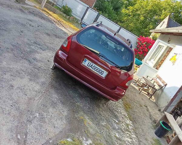 Красный Дэу Нубира, объемом двигателя 1.6 л и пробегом 340 тыс. км за 2800 $, фото 4 на Automoto.ua