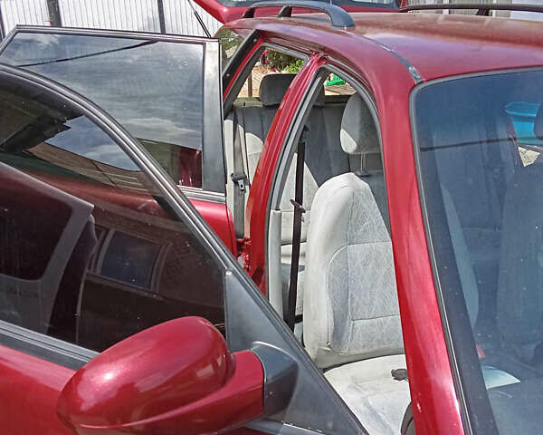 Красный Дэу Нубира, объемом двигателя 1.6 л и пробегом 340 тыс. км за 2650 $, фото 20 на Automoto.ua