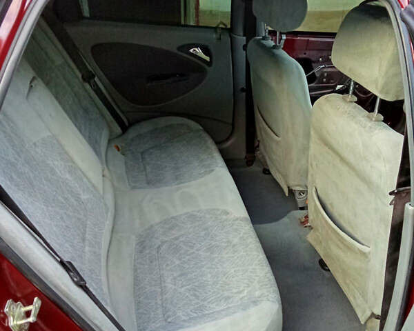 Красный Дэу Нубира, объемом двигателя 1.6 л и пробегом 340 тыс. км за 2650 $, фото 22 на Automoto.ua