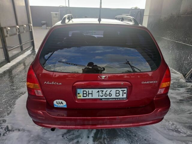 Красный Дэу Нубира, объемом двигателя 1.6 л и пробегом 110 тыс. км за 2900 $, фото 3 на Automoto.ua