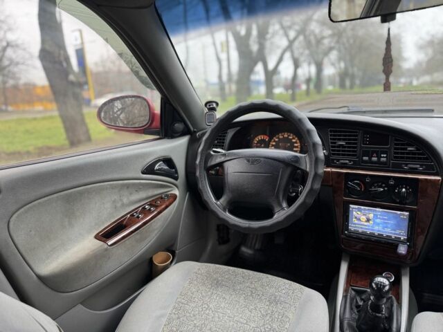 Червоний Деу Нубіра, об'ємом двигуна 2 л та пробігом 270 тис. км за 1299 $, фото 13 на Automoto.ua