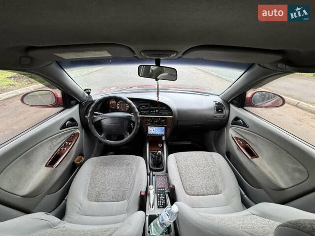 Красный Дэу Нубира, объемом двигателя 2 л и пробегом 299 тыс. км за 1299 $, фото 3 на Automoto.ua