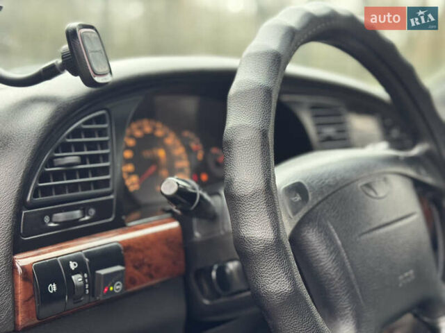 Красный Дэу Нубира, объемом двигателя 2 л и пробегом 299 тыс. км за 1299 $, фото 16 на Automoto.ua