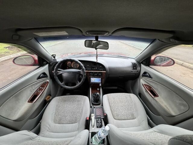 Червоний Деу Нубіра, об'ємом двигуна 2 л та пробігом 270 тис. км за 1299 $, фото 4 на Automoto.ua