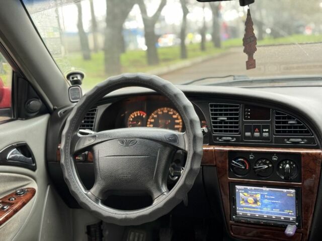 Червоний Деу Нубіра, об'ємом двигуна 2 л та пробігом 270 тис. км за 1299 $, фото 5 на Automoto.ua