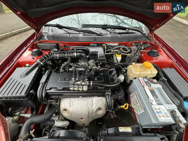 Красный Дэу Нубира, объемом двигателя 2 л и пробегом 299 тыс. км за 1299 $, фото 7 на Automoto.ua