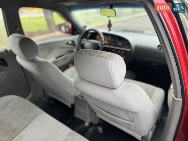 Красный Дэу Нубира, объемом двигателя 2 л и пробегом 299 тыс. км за 1299 $, фото 5 на Automoto.ua
