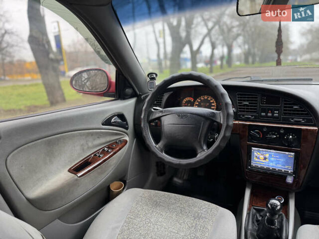 Красный Дэу Нубира, объемом двигателя 2 л и пробегом 299 тыс. км за 1299 $, фото 14 на Automoto.ua