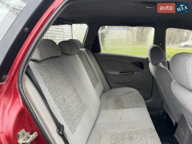 Красный Дэу Нубира, объемом двигателя 2 л и пробегом 299 тыс. км за 1299 $, фото 13 на Automoto.ua