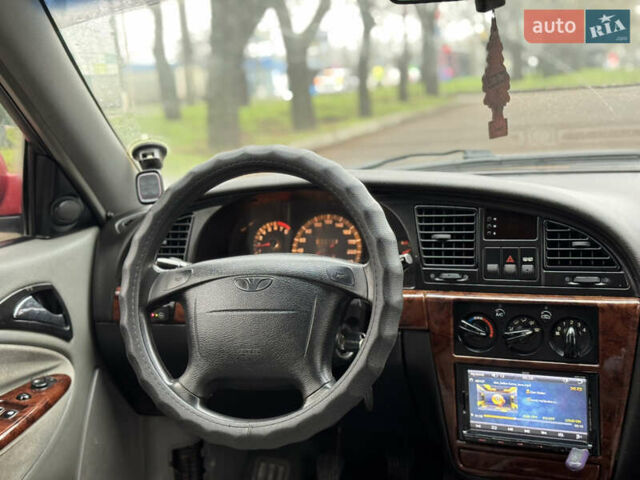 Красный Дэу Нубира, объемом двигателя 2 л и пробегом 299 тыс. км за 1299 $, фото 4 на Automoto.ua