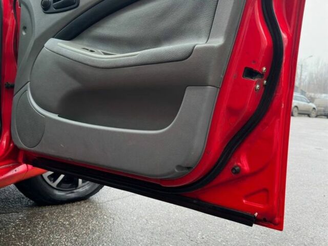 Красный Дэу Нубира, объемом двигателя 1.6 л и пробегом 295 тыс. км за 3700 $, фото 14 на Automoto.ua