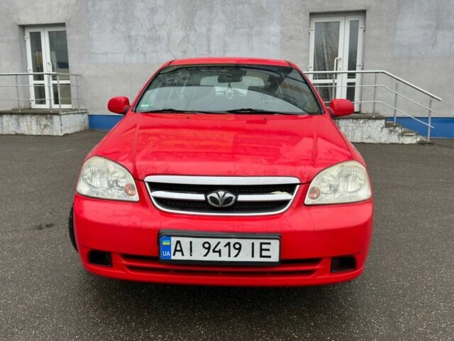 Красный Дэу Нубира, объемом двигателя 1.6 л и пробегом 295 тыс. км за 3700 $, фото 1 на Automoto.ua