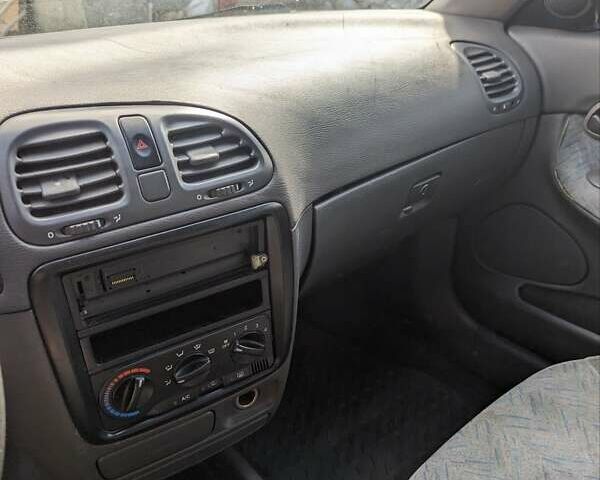 Деу Нубіра, об'ємом двигуна 1.6 л та пробігом 351 тис. км за 900 $, фото 5 на Automoto.ua