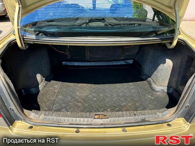 Жовтий Деу Нубіра, об'ємом двигуна 2 л та пробігом 310 тис. км за 2200 $, фото 6 на Automoto.ua