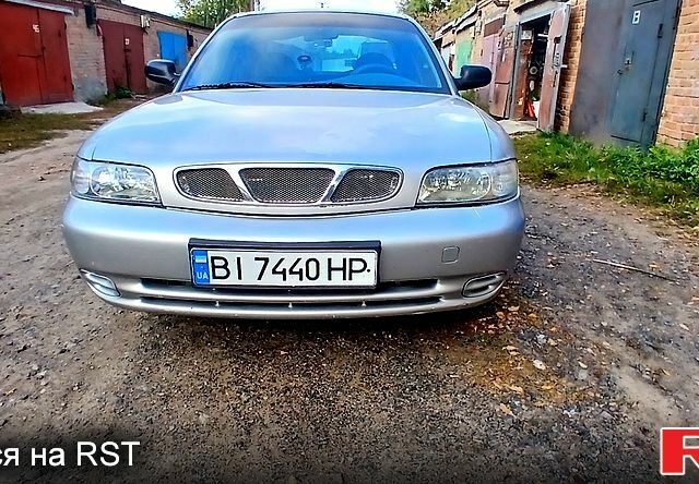 Сірий Деу Нубіра, об'ємом двигуна 1.6 л та пробігом 300 тис. км за 2000 $, фото 5 на Automoto.ua