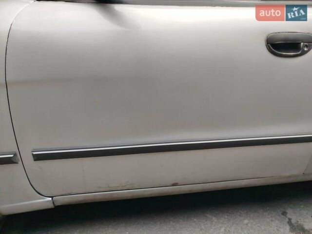 Сірий Деу Нубіра, об'ємом двигуна 1.6 л та пробігом 262 тис. км за 1750 $, фото 2 на Automoto.ua