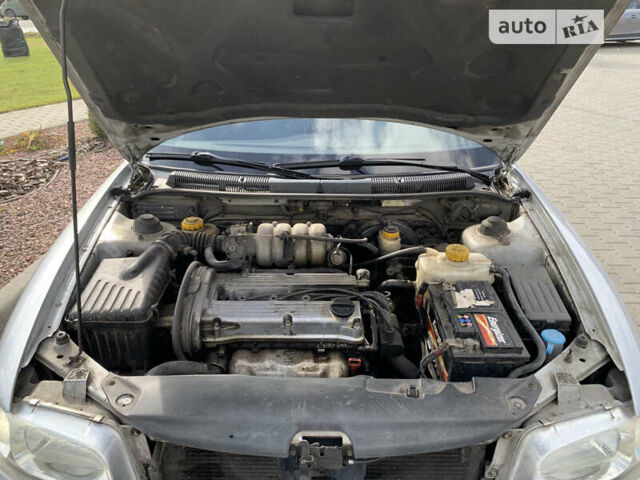 Сірий Деу Нубіра, об'ємом двигуна 1.6 л та пробігом 161 тис. км за 1799 $, фото 18 на Automoto.ua
