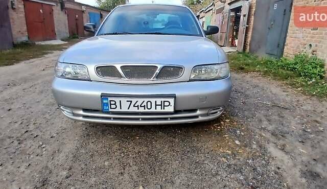 Сірий Деу Нубіра, об'ємом двигуна 1.6 л та пробігом 300 тис. км за 2000 $, фото 5 на Automoto.ua