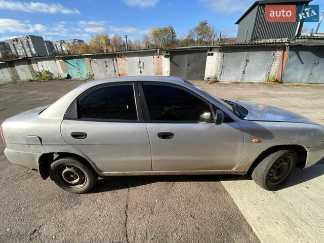 Сірий Деу Нубіра, об'ємом двигуна 1.6 л та пробігом 255 тис. км за 715 $, фото 8 на Automoto.ua